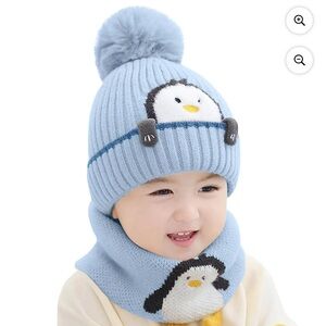 blue knitted children's winter penguin hat and scarf set